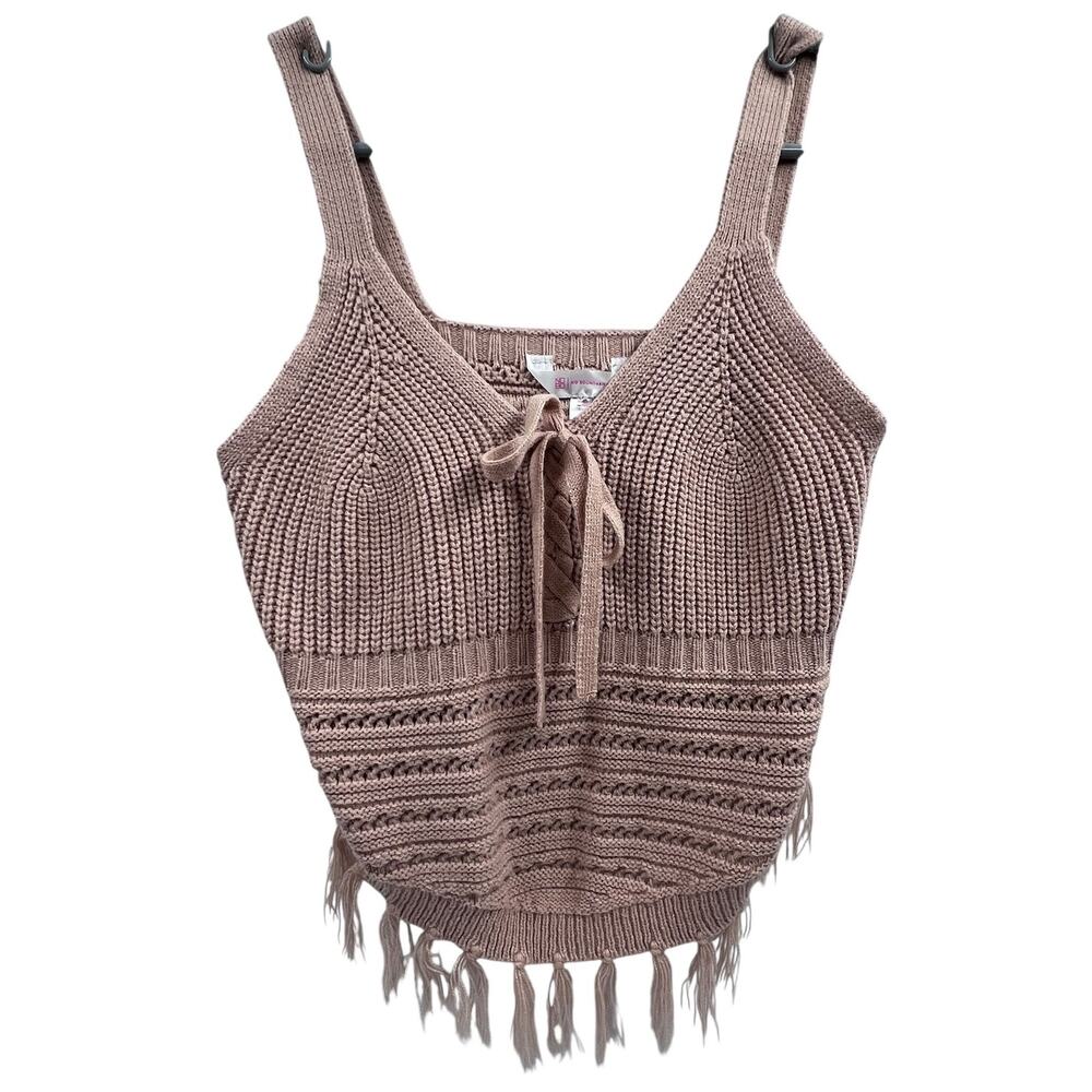 No Boundaries sweater tank features a prominent tie-front neckline